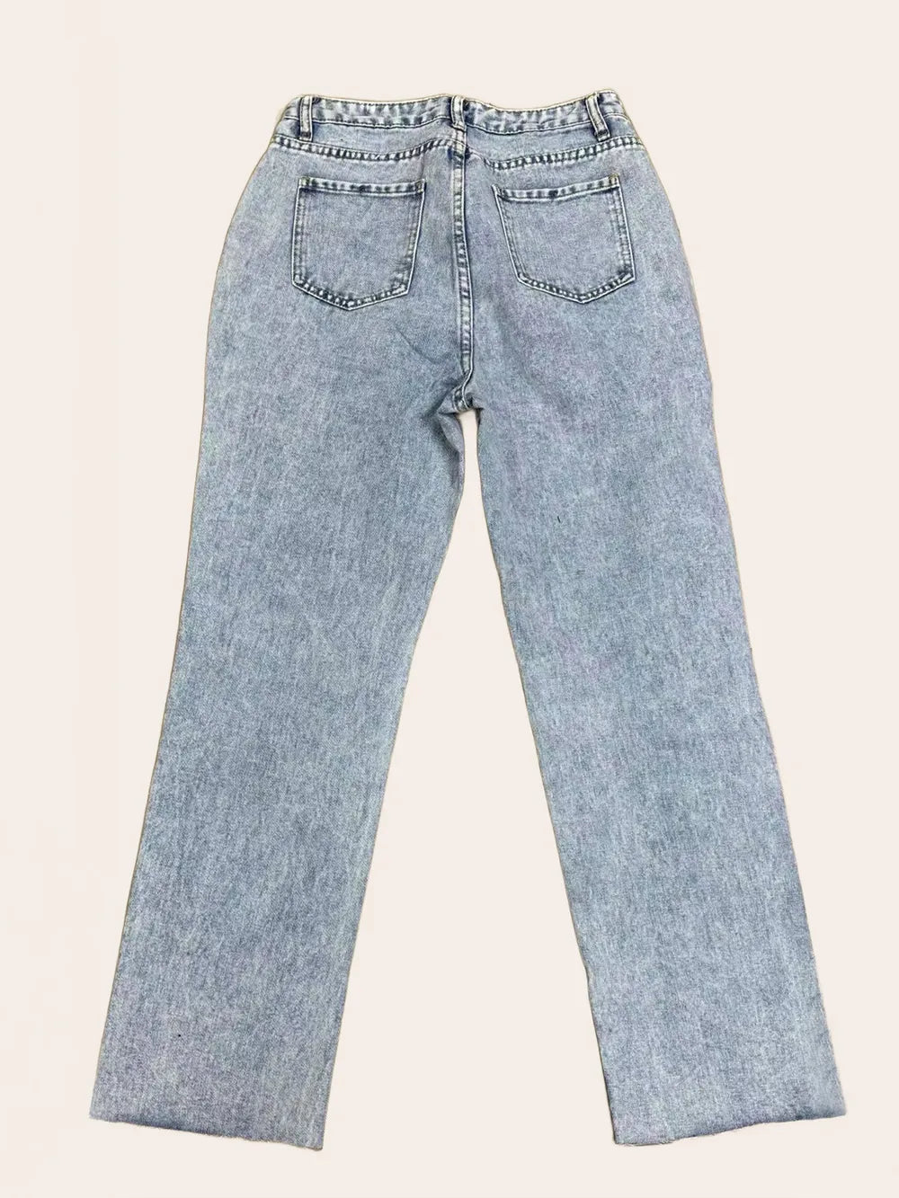 Distressed straight leg jeans distressed detailing