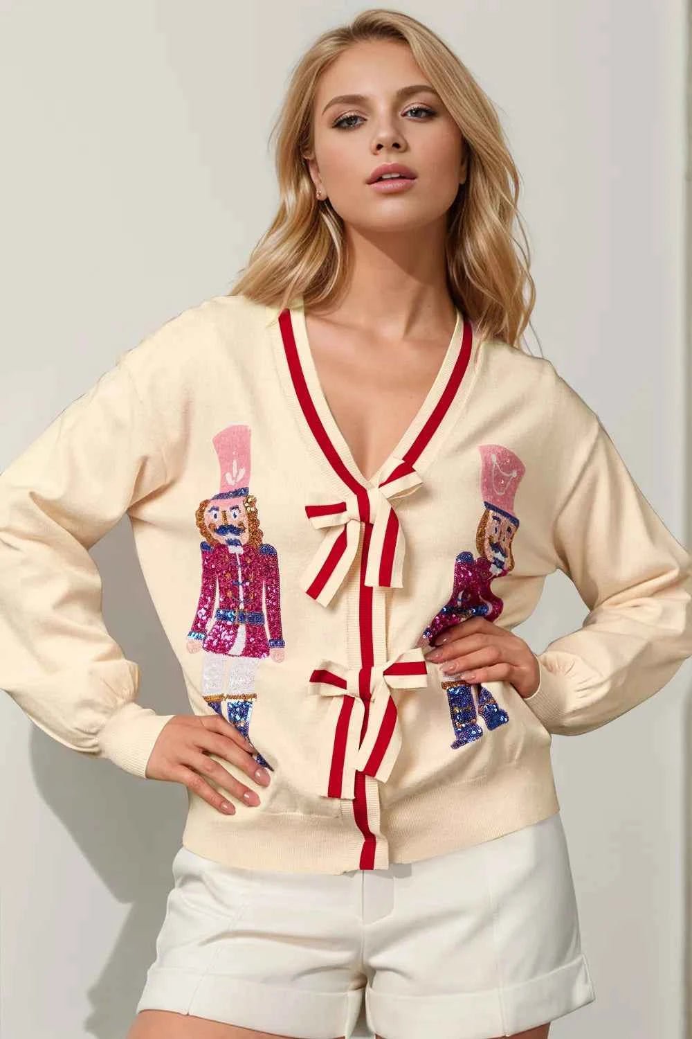 Double Take Full Size Nutcracker Sequin Bow Decor Cardigan - ELC Fashion